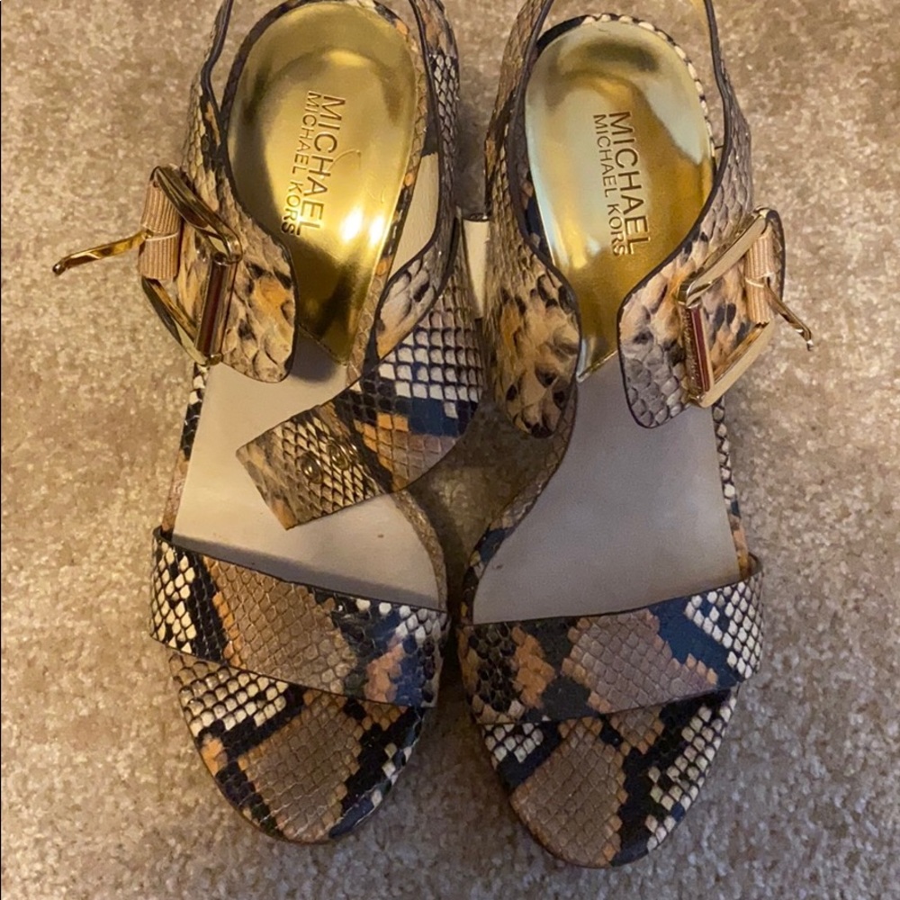 Micheal Kors strapp heels good condition .
